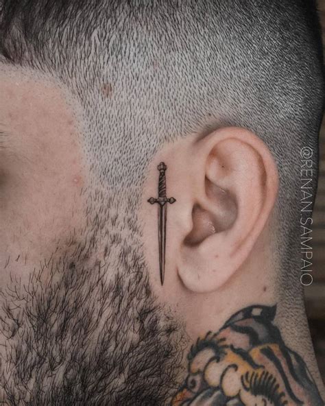 dagger face tattoo meaning